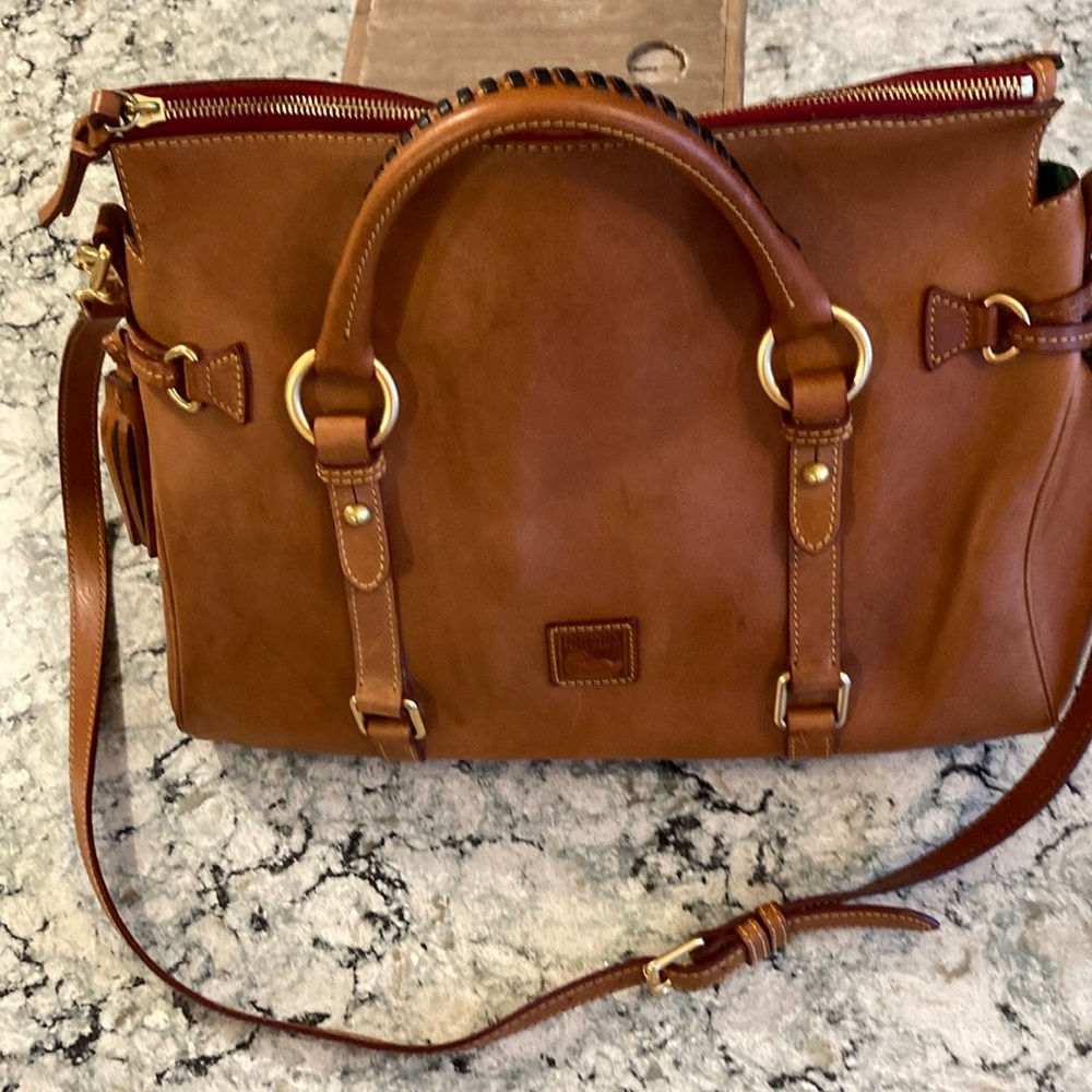 Dooney & Bourke brown leather satchel bag red lining, brass trim and zipper